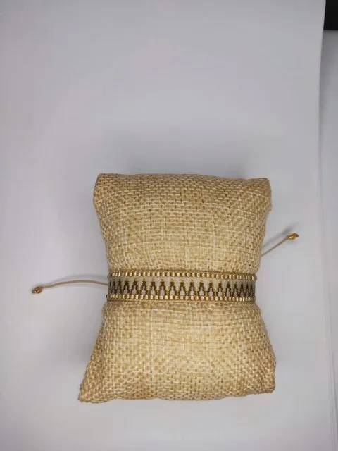 Sutil Encanto Oro, pulsera de telar en tonos cálidos